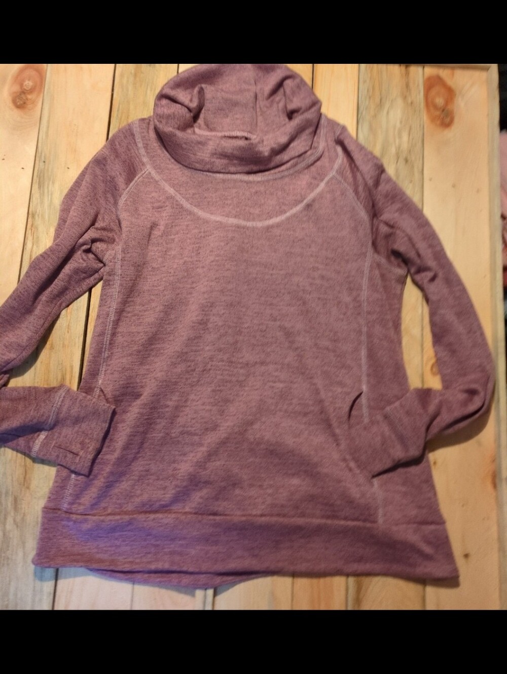 Kuhl long sleeve pullover with front pockets and thumb holes
